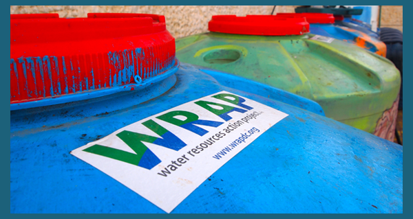 wrapbarreln One of the Water Resources Action Project's rain collection installations.